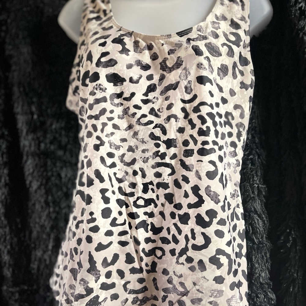 Brand: Tapemeasurer, well loved. Stretch tank. Xxl